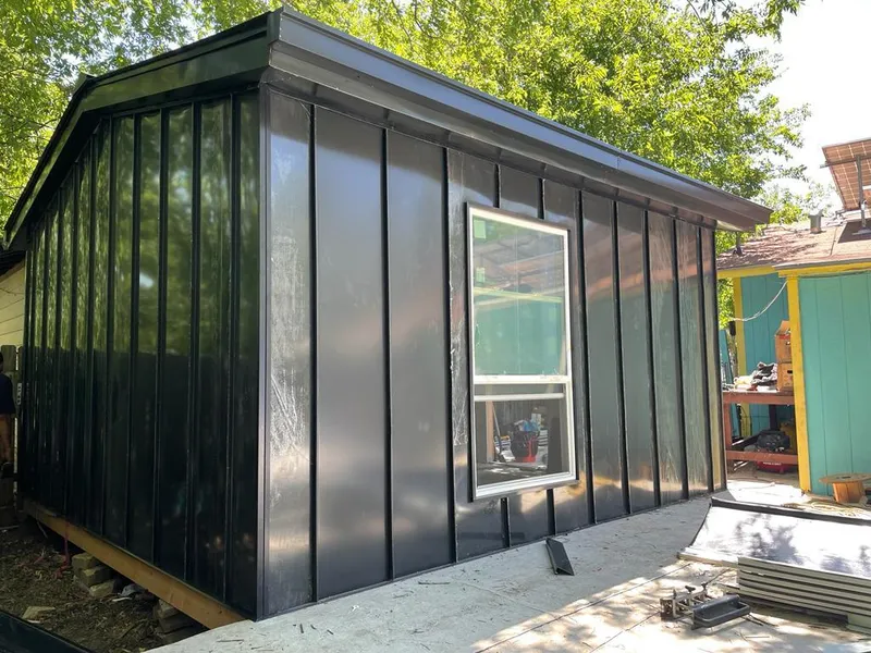 Black standing seam metal wall panels for Roof Inspection in North Las Vegas